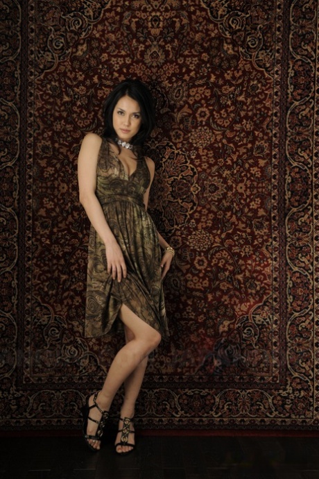 Japanese beauty Maria Ozawa models non nude in a dress and jewelry