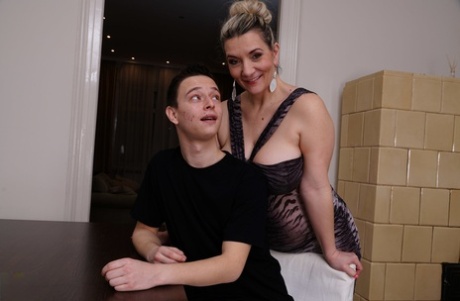 Big titted cougar seduces a young boy for hardcore sex in sleeveless dress