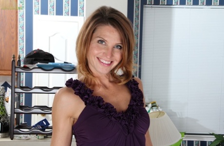 Svelte MILF Sky Rodgers striping down and spreading her pussy lips