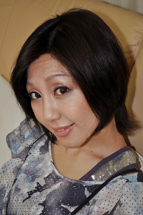 Pretty asian MILF Mayumi Iihara undressing and masturbating her cunt