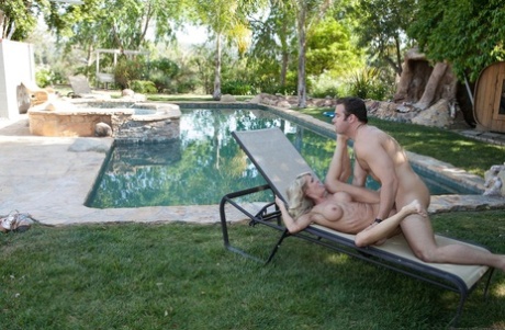 MILF in a pink bikini Mikky Lyn, blows a large dick and gets fucked outdoors