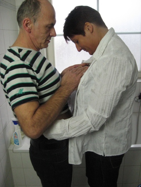 Short haired, big titted German MILF rides oldman cock in the bathroom