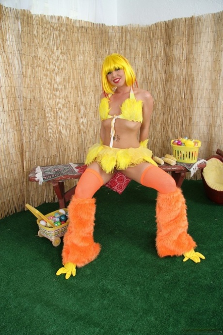 Slutty pornstar in yellow uniform Julie Night showing big tits and ass in solo