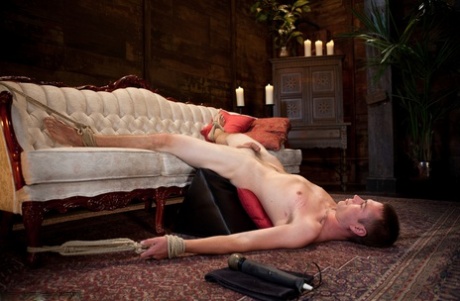 Maitresse Madeline Marlowe sits on her slave's face & makes him lick her holes