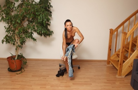 Newbie Gina Devine undresses at the casting and shows her tattooed tanned body