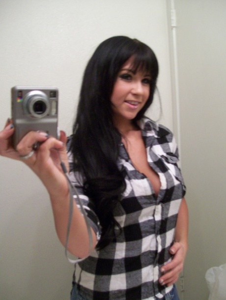 Lovely brunette shows off her gorgeous big boobs & her sweet pink pussy